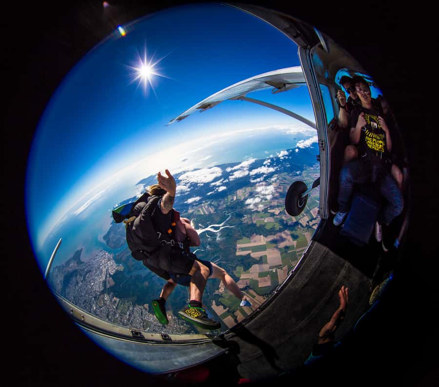 Cairns: Tandem Skydive Experience - Landing, photos, and the extra cost
