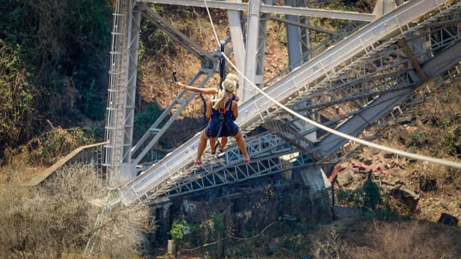 Experience Bungee, Swing & Slide from Victoria Falls Bridge - The bridge swing: a longer arc over the gorge