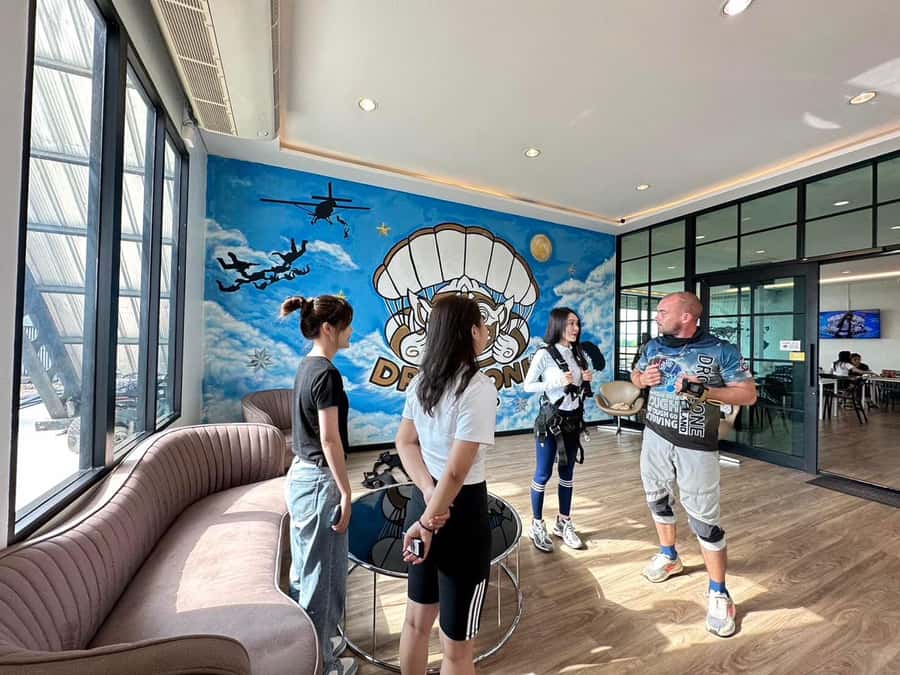 Pattaya: Dropzone Tandem Skydive Experience with Ocean Views - Getting suited up with the right footwear